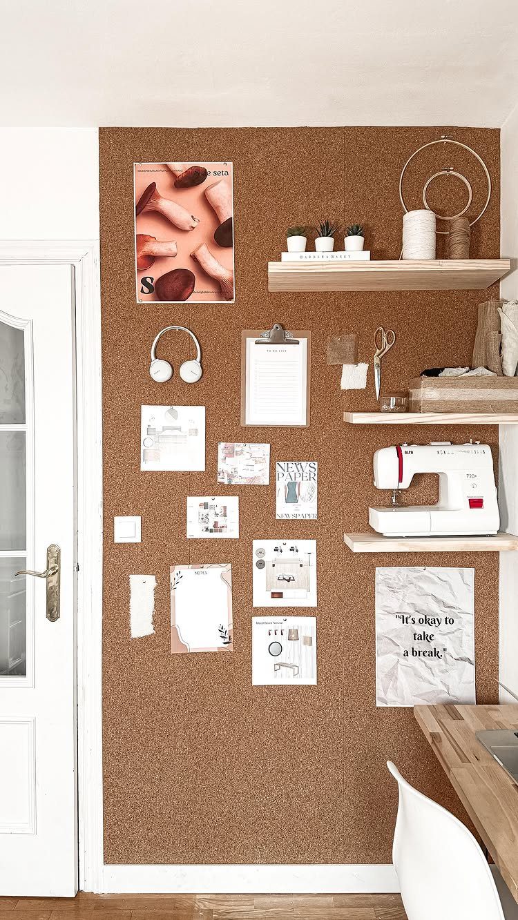 Corkboard accent wall decorated with shelves, a sewing machine, and various pinned notes and photos.