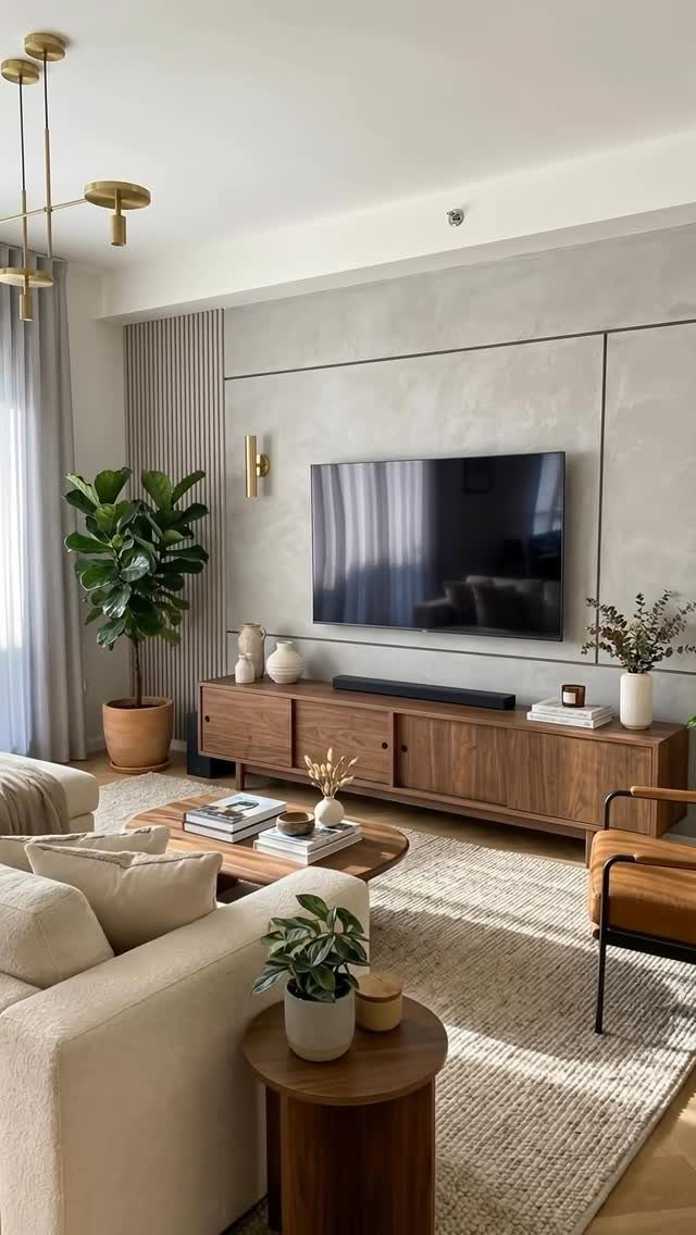 9 Interior Accent Wall Ideas with Photos 8 A grey concrete accent wall serves as the backdrop for a television and wooden media console.
