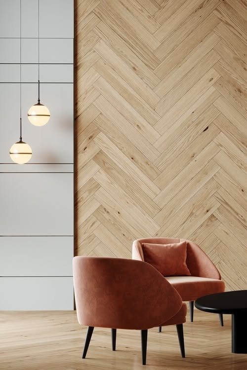 9 Interior Accent Wall Ideas with Photos 6 Light wood herringbone patterned wall with terracotta velvet armchairs and pendant lights.