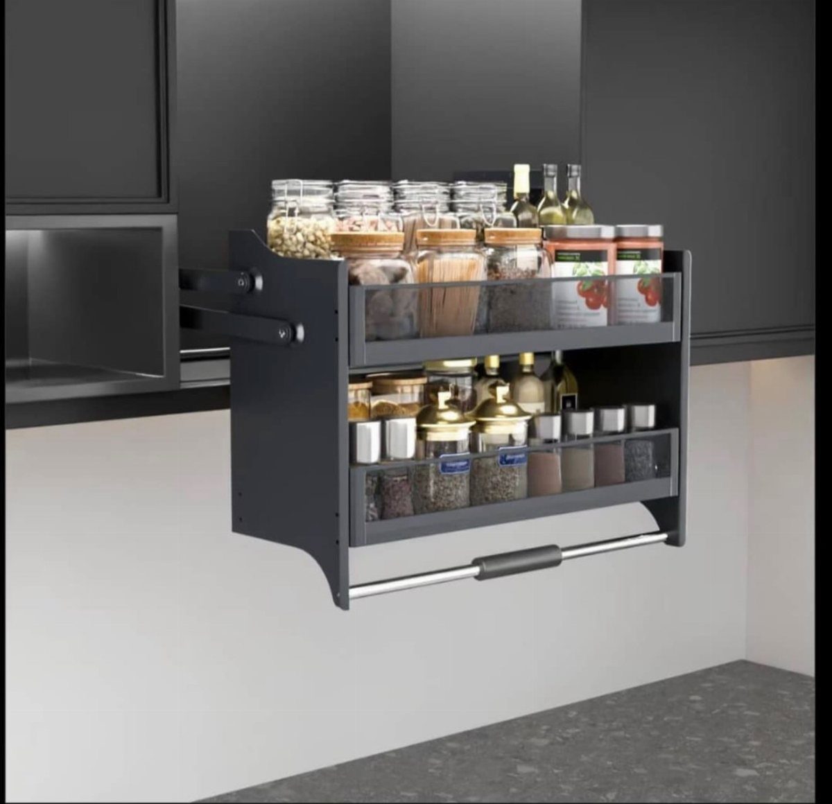 Pull Down Upper Cabinet: 5 Storage Solutions That Actually Work 4 A black two-tier pull-down spice rack filled with glass jars mounted under a kitchen cabinet.