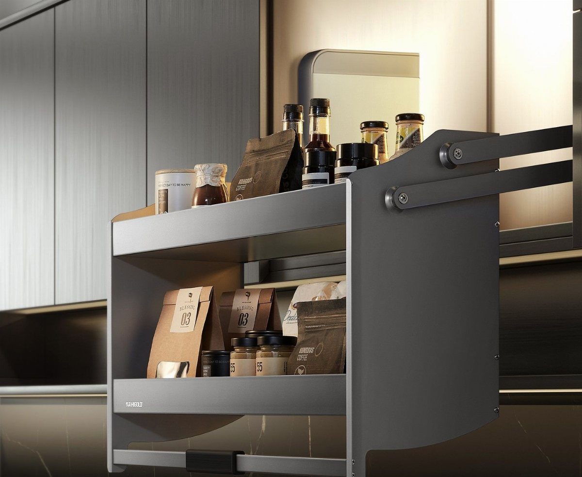 Pull Down Upper Cabinet: 5 Storage Solutions That Actually Work 2 A grey tiered pull-down kitchen rack holding various jars and coffee bags inside a cabinet.