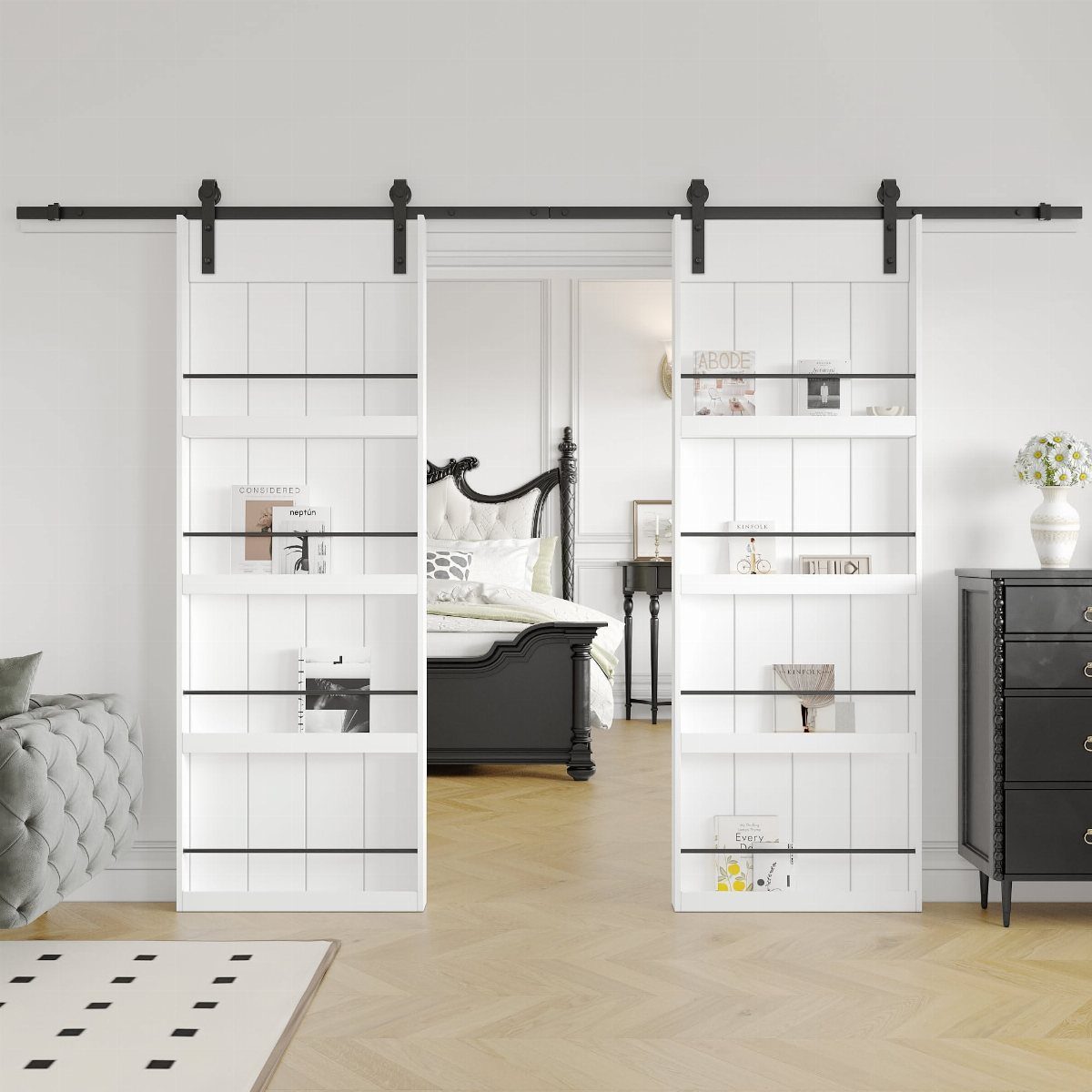 Two white sliding barn doors with black metal shelves serving as a bookshelf doorway to a bedroom.